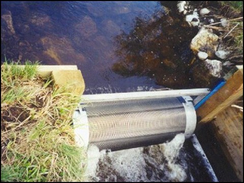 Hydro-Drum mounted at discharge from pond
